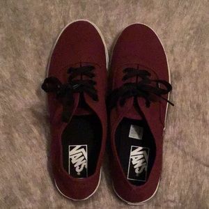 Vans marooncanvas shoes with black shoe strings.